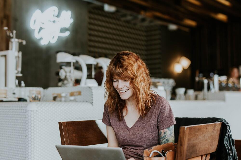 woman taking psychometric test for recruitment in cafe